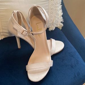 Lulu’s size 8.5 cream colored strappy heels